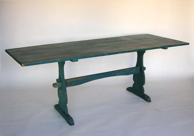 Narrow trestle table with original blue paint and decorative flower from around 1920. Nice patina throughout.
FOR OUR COMPLETE INVENTORY PLEASE GO TO www.dosgallos.com