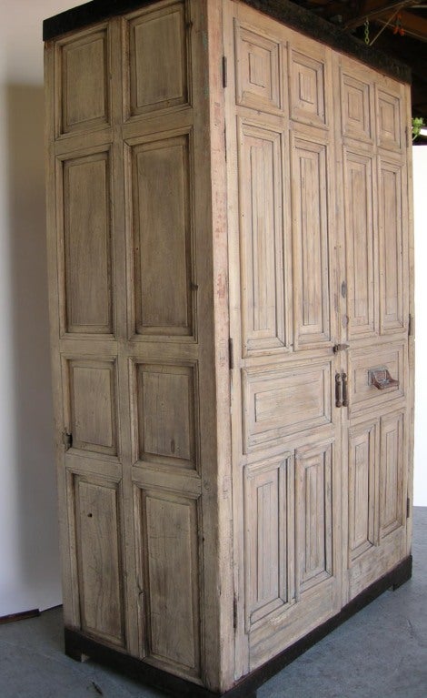 Large scale armoire consisting of 19th c doors, one with original mail slot. three interior shelves. Hand forged iron banding on top and bottom
WE ARE HAVING A SALE ON ALL OUR INVENTORY UNTIL OCTOBER 5TH, 2013. PLEASE VISIT WWW.DOSGALLOS.COM FOR