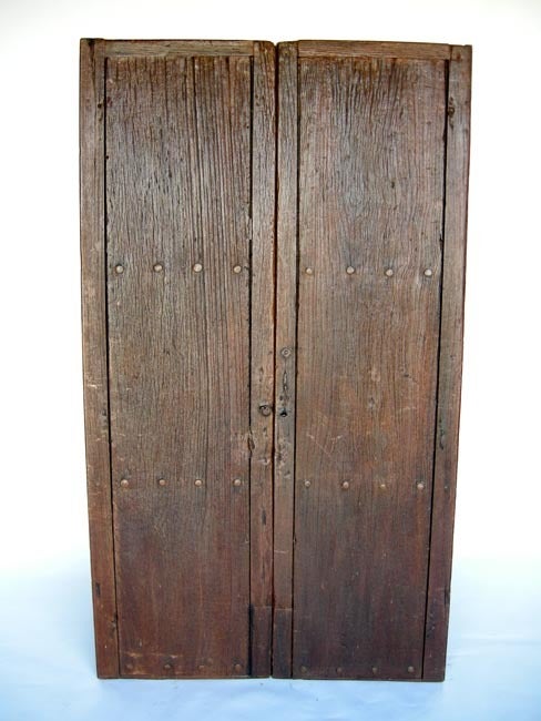 19th c. narrow and tall doors with clavos - nails. Beautiful weathered patina.