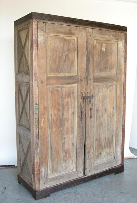 Colonial door armoire with contemporary metal bandings. Old hardware.
interior depth 20.5