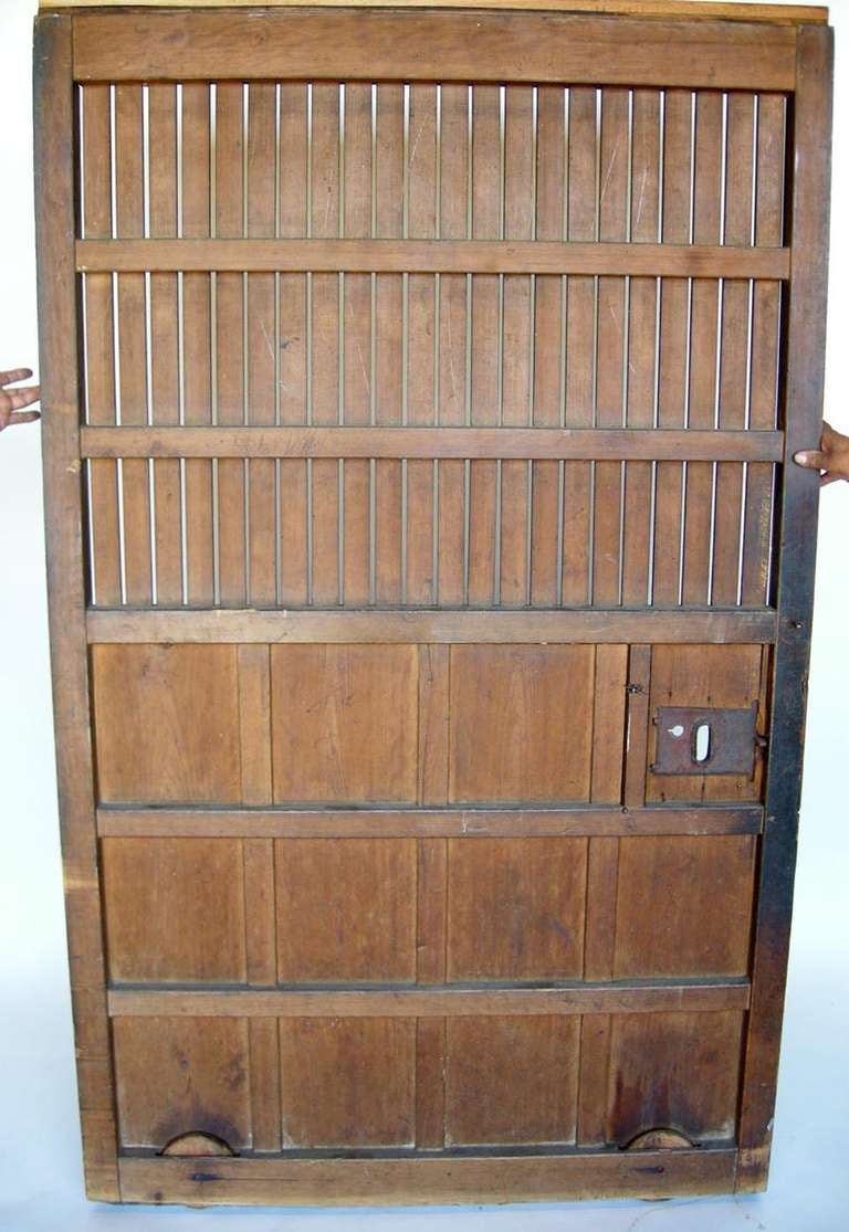 Antique weathered Japanese Elm wood sliding door with wheels. Great patina.
