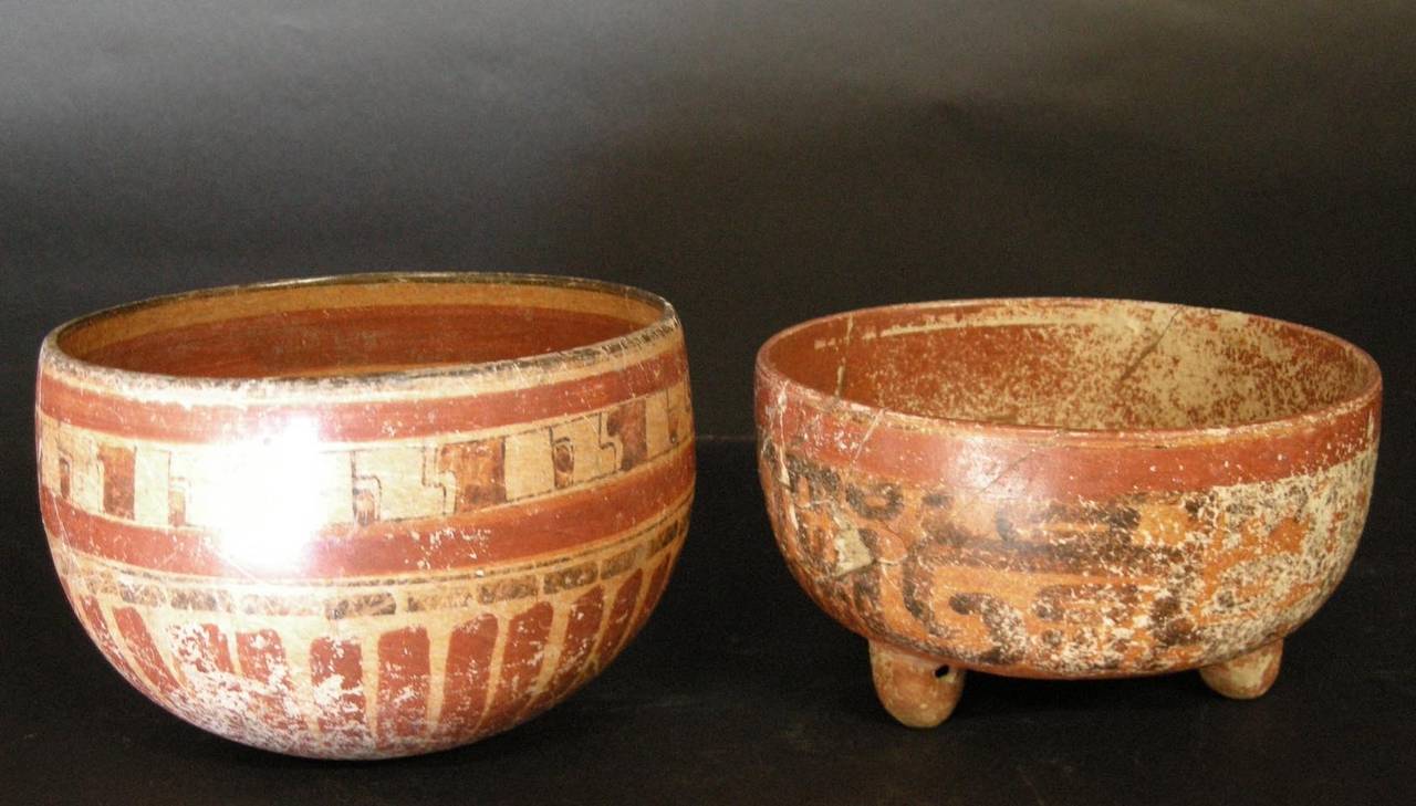 Post Classic pre-Columbian vessels from ancient Mayan Guatemala. These polychrome pieces survived centuries. Often painted depicting cosmologies, religion, and philosophy, ceramic painting was a major focus of the visual arts and communication. No