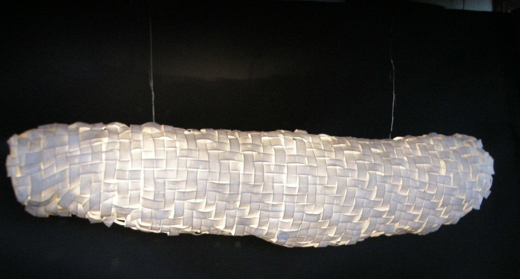 Large scale hand made Japanese paper woven light, called Nagagumo . Can be made in custom sizes. Beautiful shape over a table creating soft light.