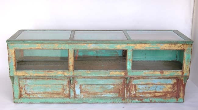 Antique mostrador - store display/counter, with layers of original paint. Front and top has glass for displaying items. Back has doors with several drawers