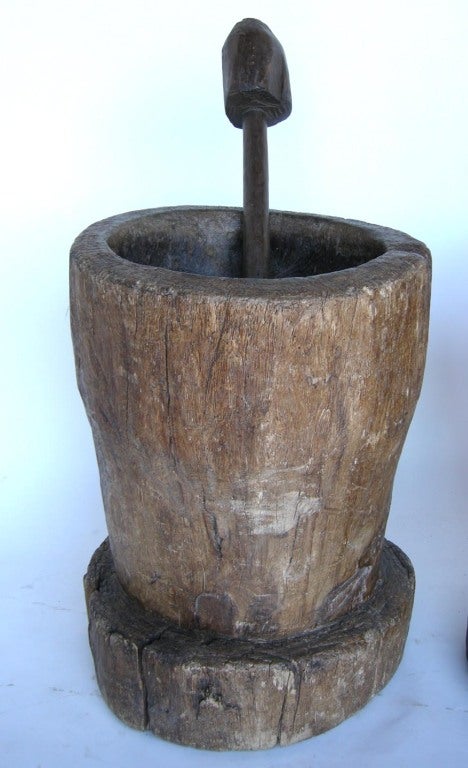 19th c. conacaste wood morteros - mortars - carved out of a tree trunk. Great patina om both, comes with pestle. 
L: 24Dx31H R: 22Dx31H
Sold separately