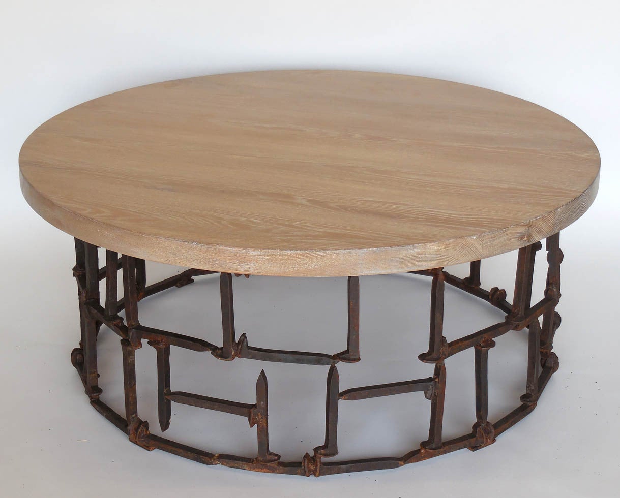 Custom round coffee table with natural and white ceruse oak top, 1 3/4 inch thick. Base consists of vintage rail road spikes in a random pattern. Made in Los Angeles by Dos Gallos Studio.
CUSTOM PRICES ARE SUBJECT TO CHANGE. PLEASE INQUIRE BEFORE