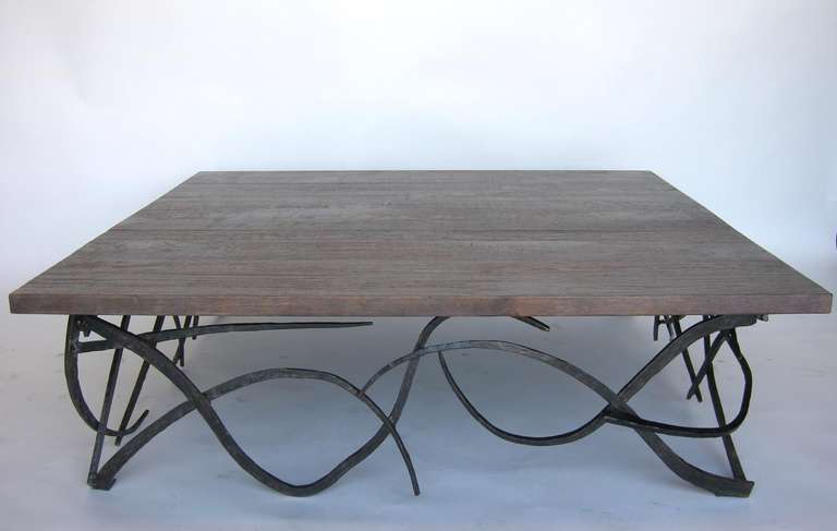 Custom hand-wrought iron coffee table with walnut top. Can be made in any size and in a variety of finishes. Made in Los Angeles by Dos Gallos Studio.