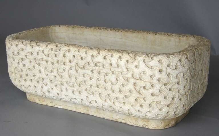 Basket weave carved honed marble planter, small chip at bottom other wise in very good condition.