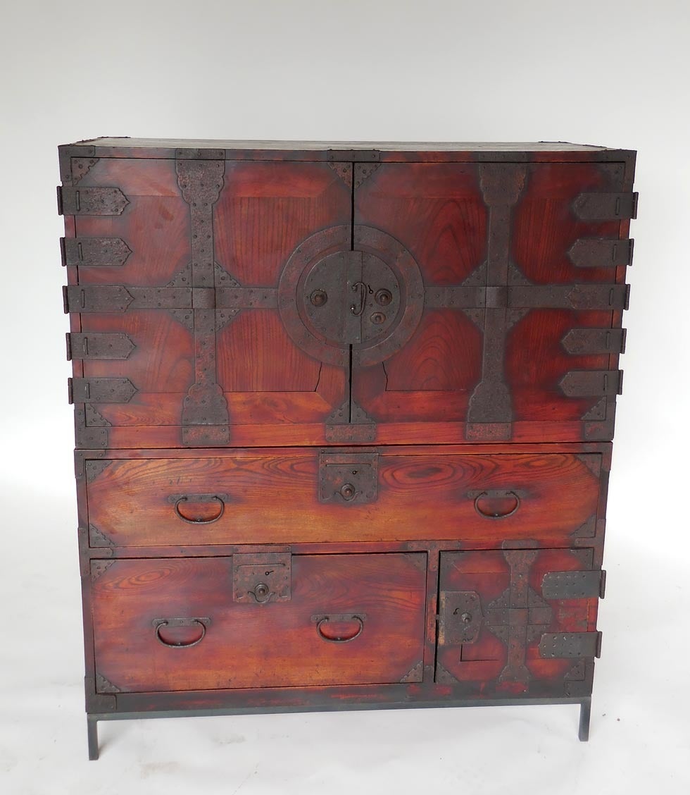 Early 19th century Japanese tansu with traces of paint. Top part behind doors can be used with existing drawers or drawers can be removed for use of shelf space.
Bamboo nails and all original iron hardware, a few small pieces missing.
