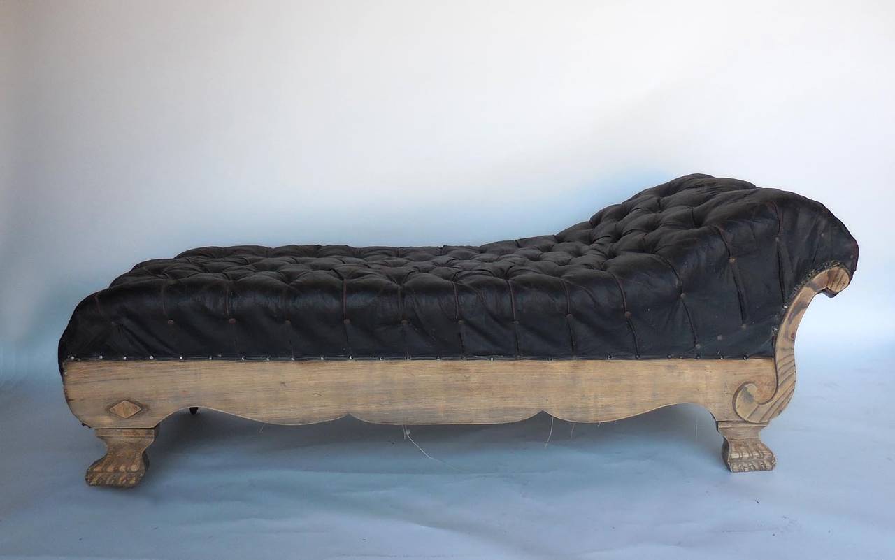 All original psychiatrist couch with original painted canvas upholstery, horsehair interior, original springs. Oak frame. In original condition. Sold as is.