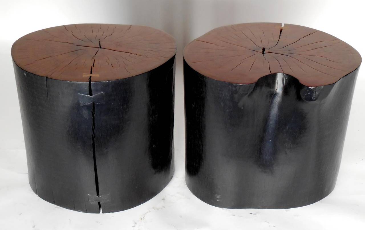 Handsome pair of walang wood side tables. Beautiful patina and wood grain. Butterfly repairs add to the design.
Left measures 21 x 18 x 20.25 and the right measures 22.5 x 19.5 x 19.75 H. Can be sold separately.
