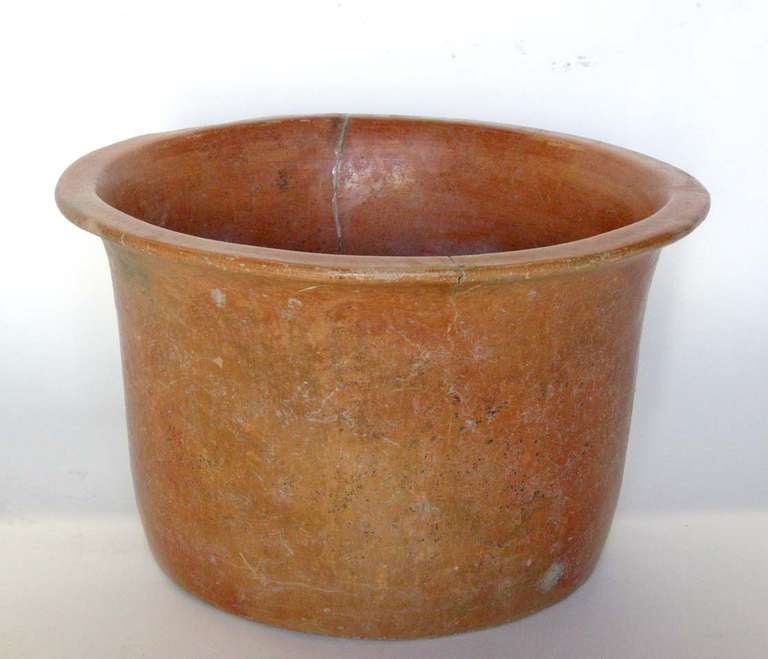 Antique vessel with old repairs. Great patina!