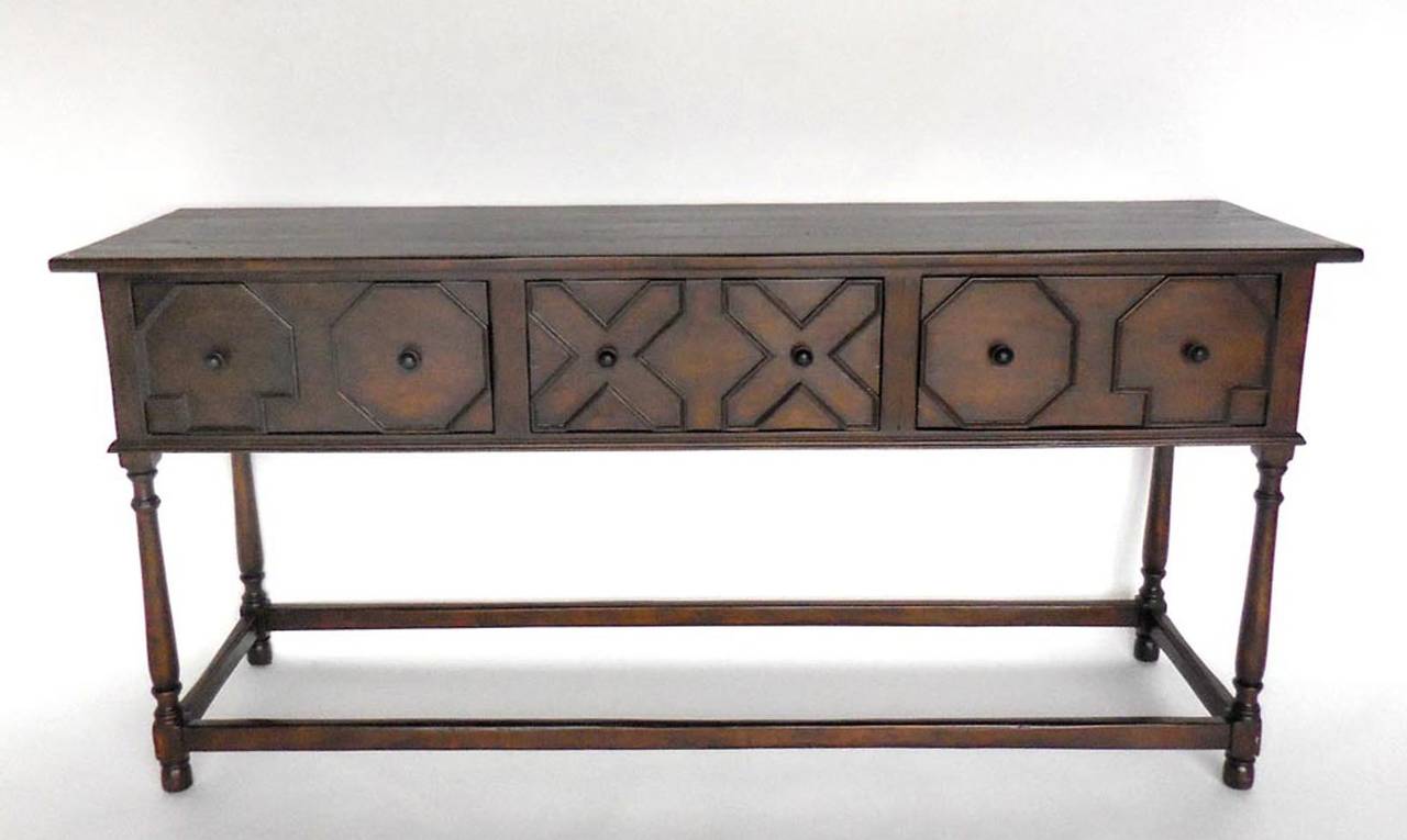 Custom walnut console featuring three drawers with applied geometric motif. Turned legs. Very graceful and beautiful. Can be made in custom sizes in walnut, mahogany or oak and in a variety of finishes. Made by Dos Gallos studio in Los Angeles.