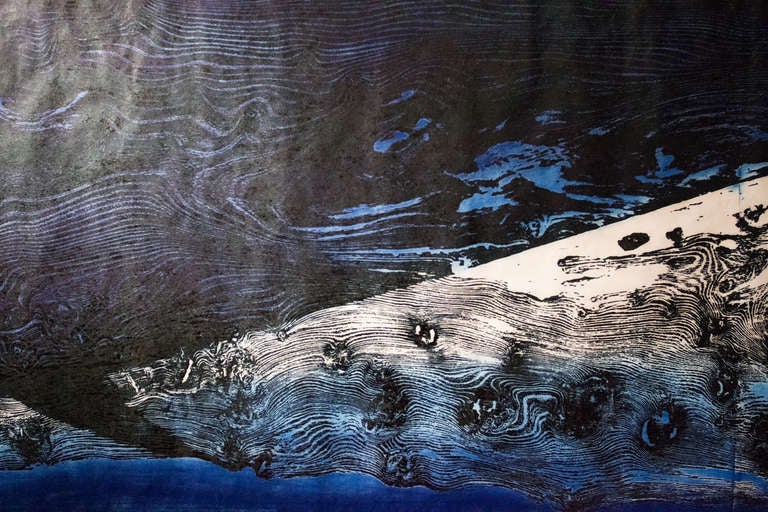 A large scale woodblock print by British artist Julian Meredith, depicting an enormous tuna swimming in deep indigo blue water surrounded by his slipstream. The woodblock is a very limited edition print made by the artist on hand-made rice paper and
