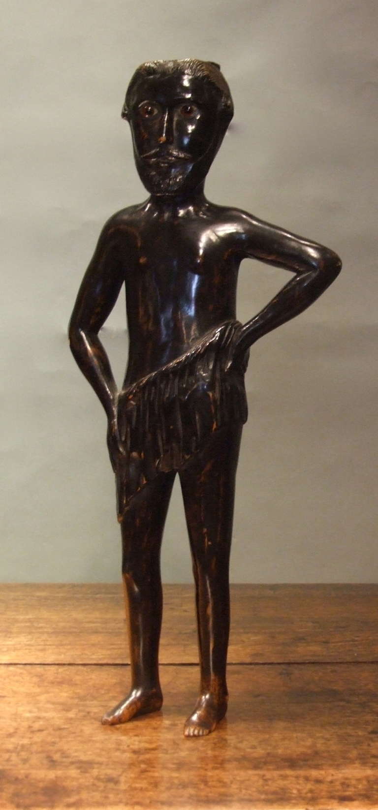 Most unusual English early 19th Century folk art carving of a wild man, most likely a newel post figure, depicted with groomed European hair, beard and mustache, but otherwise 
