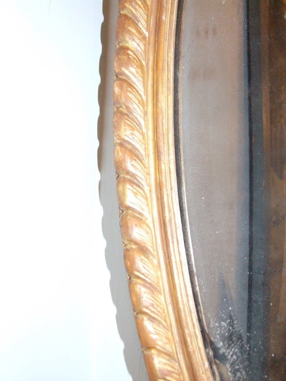 Late 18th Century Large George III Oval Gilt Wood Mirror