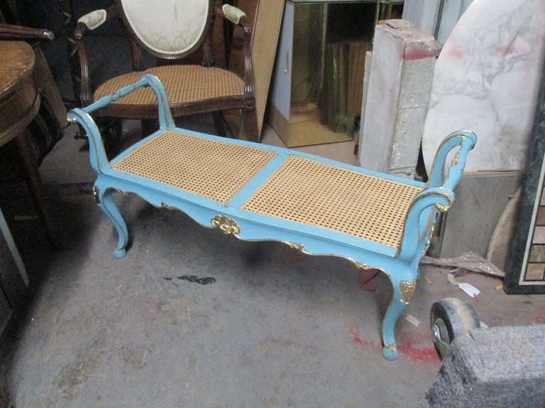 A Pair of Blue-Painted and Gilded Louis XV Style Caned Benches