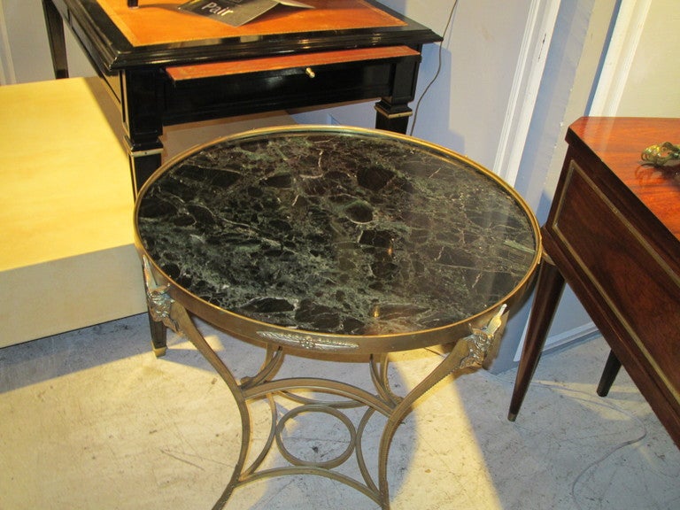 Exquisite bronze gueridon table.
