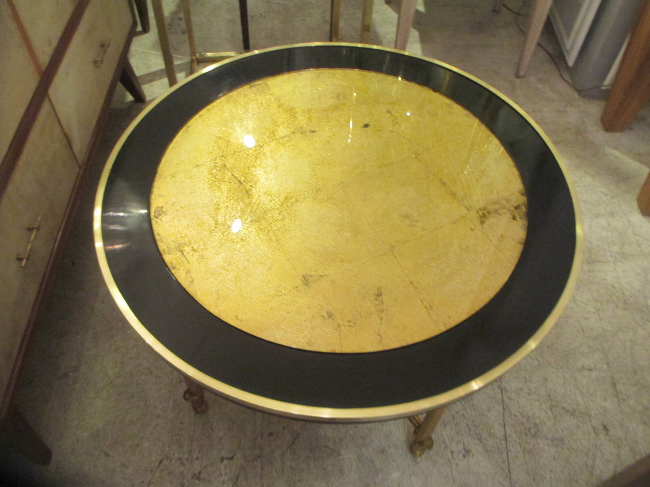 Circular Cocktail Table with Gilt Glass Top In Excellent Condition In New York, NY