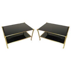 A Pair of Two-Tiered Smoked Glass and Brass Coffee Table  on Castors