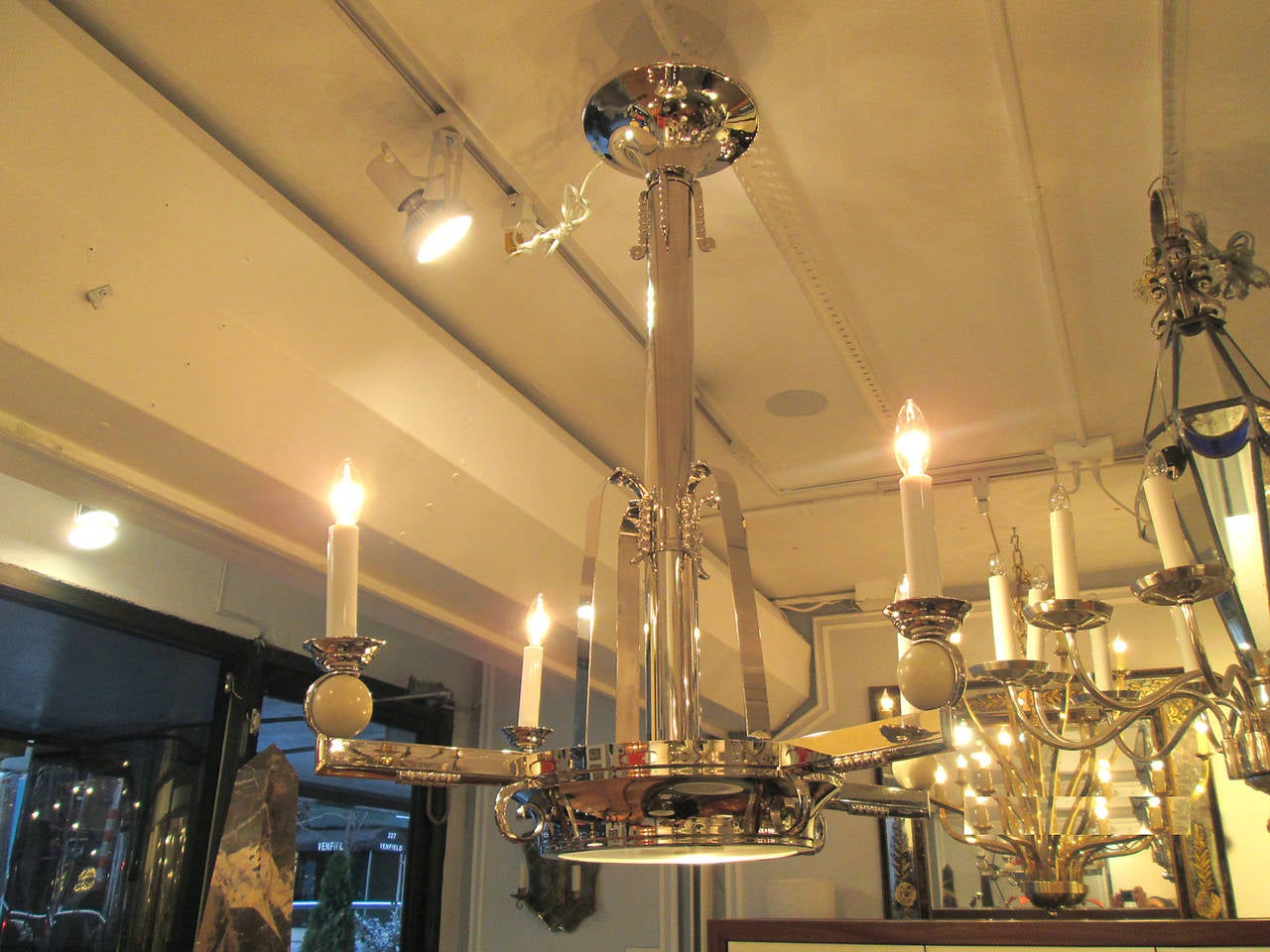 A pair of nickel-plated Vienna Secessionist light fixtures.