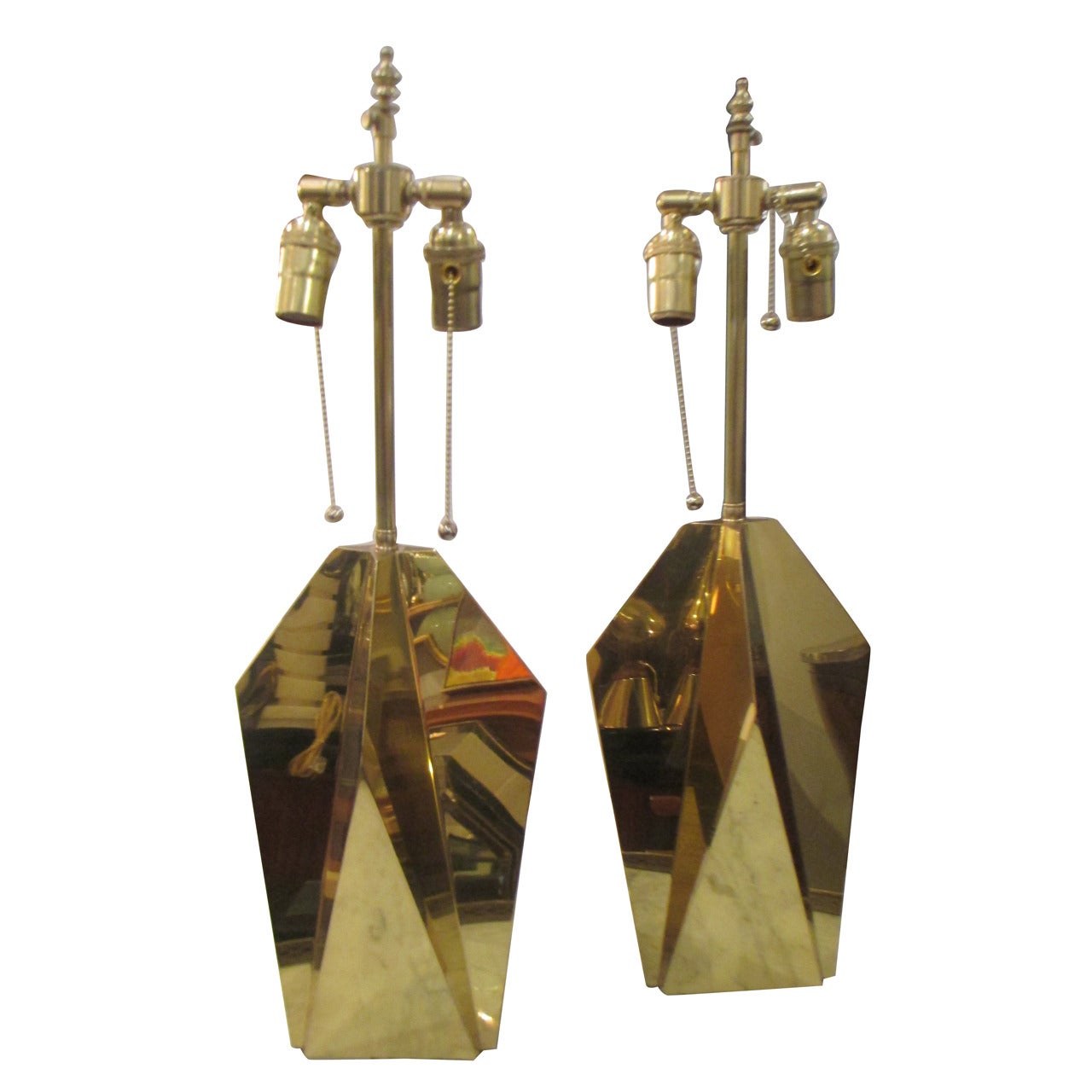 Pair of modernist brass faceted table lamps.
