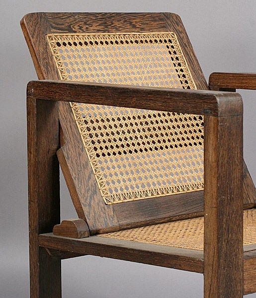 A Sculptural Pair of French 40's Caned Club Chairs