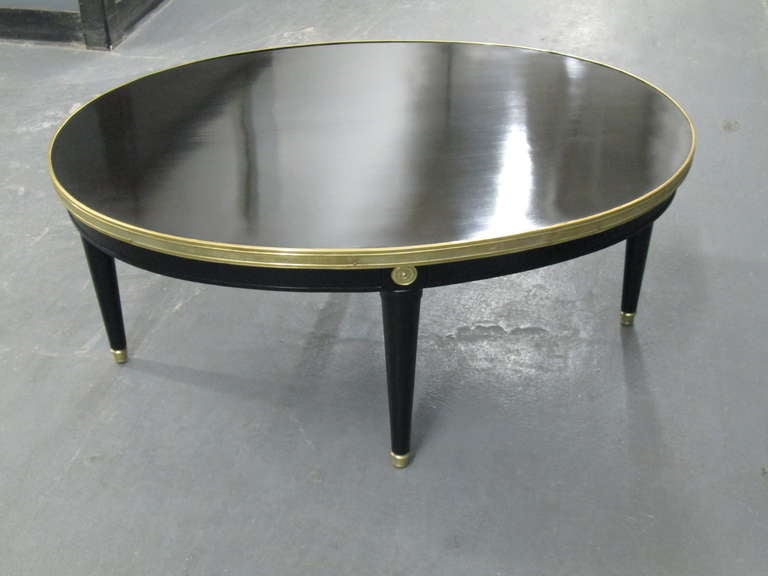 Oval Ebonized Coffee table with Brass