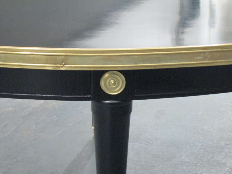 French Oval Ebonized Coffee Table With Brass