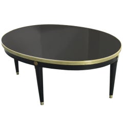 Oval Ebonized Coffee Table With Brass