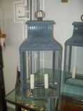 A pair of tole two-light lanterns