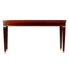 A Jean- Michel Frank Style mahogany flip top table