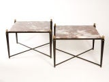 Pair of steel end tables with marble tops and brass accents