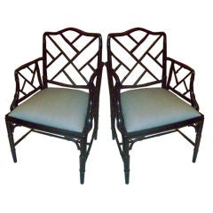 A pair of Ebonized Chinese-Chippendale Style Chairs