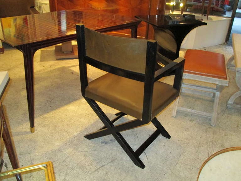 A Pair of Ebonized Leather and Brass Director's Chairs 1