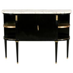 French Louis XVI style ebonized cabinet on tapered legs