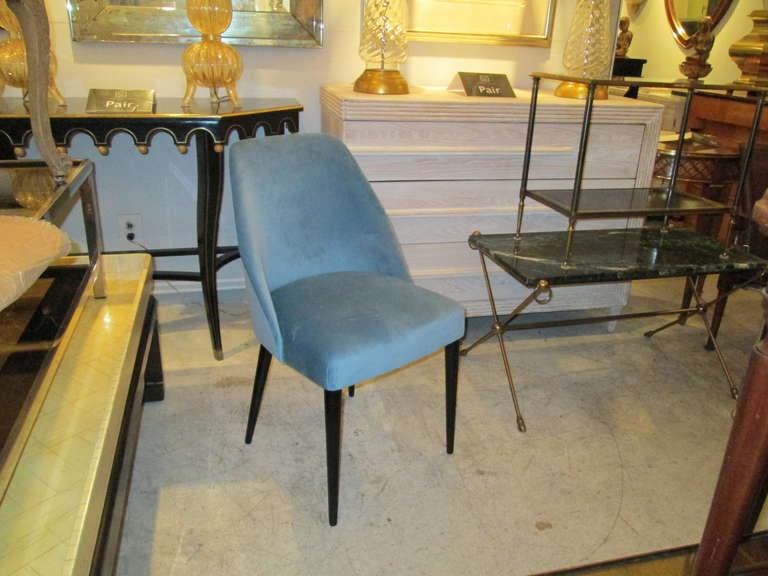 Pair of Mid-Century Modern chairs, velvet upholstery on ebonized legs.