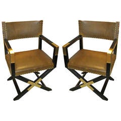 A Pair of Ebonized Leather and Brass Director's Chairs