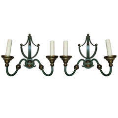 A Whimsical Pair Of Painted Iron And Brass Sconces