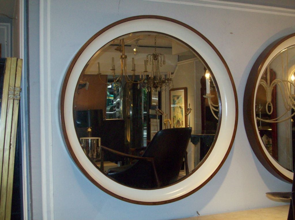 A custom faux-bois painted lacquered mirror. The faux-painting simulates Macassar ebony. The mirrors can be sold individually for $9,500 each.

Please note that these mirrors are custom made and can be made to your specifications. Turnaround time:
