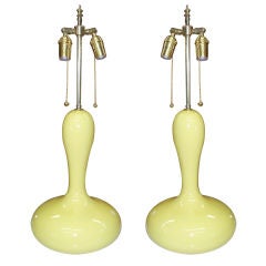 A pair of orb-shaped porcelain lamps