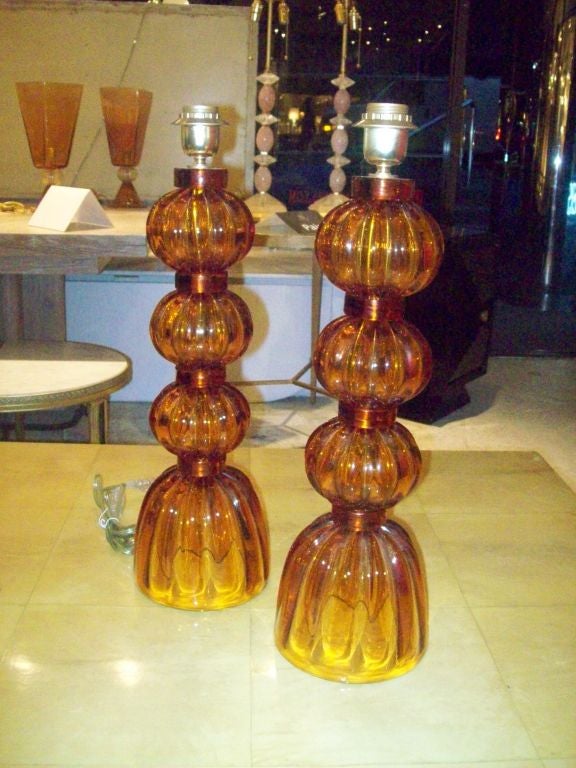A Pair of  Murano Signed Amber Sphere Lamps