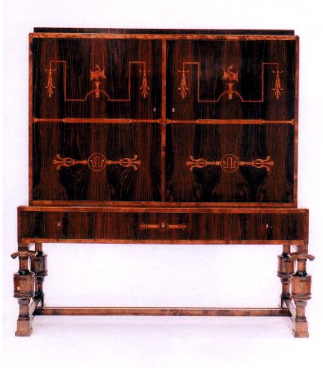 Elegant Carl Malmsten Swedish Grace Period Cabinet, circa 1924
Macassar and Stained Birch Cabinet with Inlays of Fruit and Exotic Woods
2 Doors opening up to a shelved interior, 3 drawers on bottom