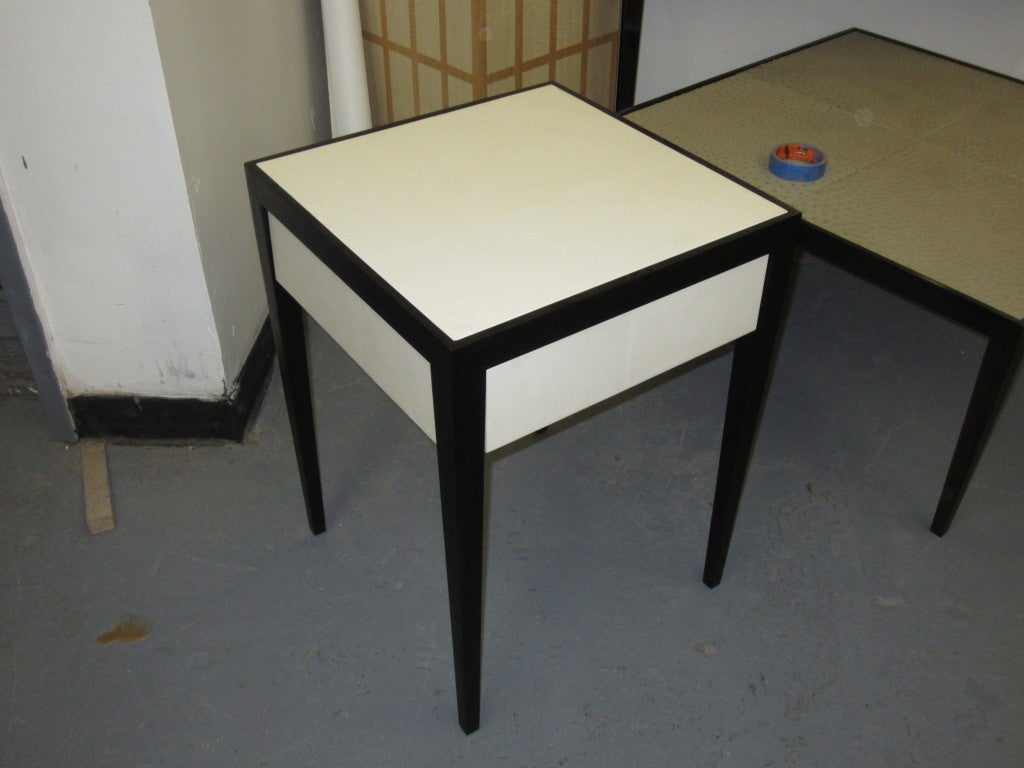 Pair of custom ebonized parchment end tables with central drawer.
Please note that these can be customized to your specifications.