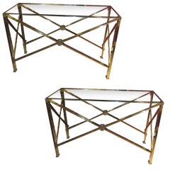 A Pair of Regency Style Bronze and Chrome console tables