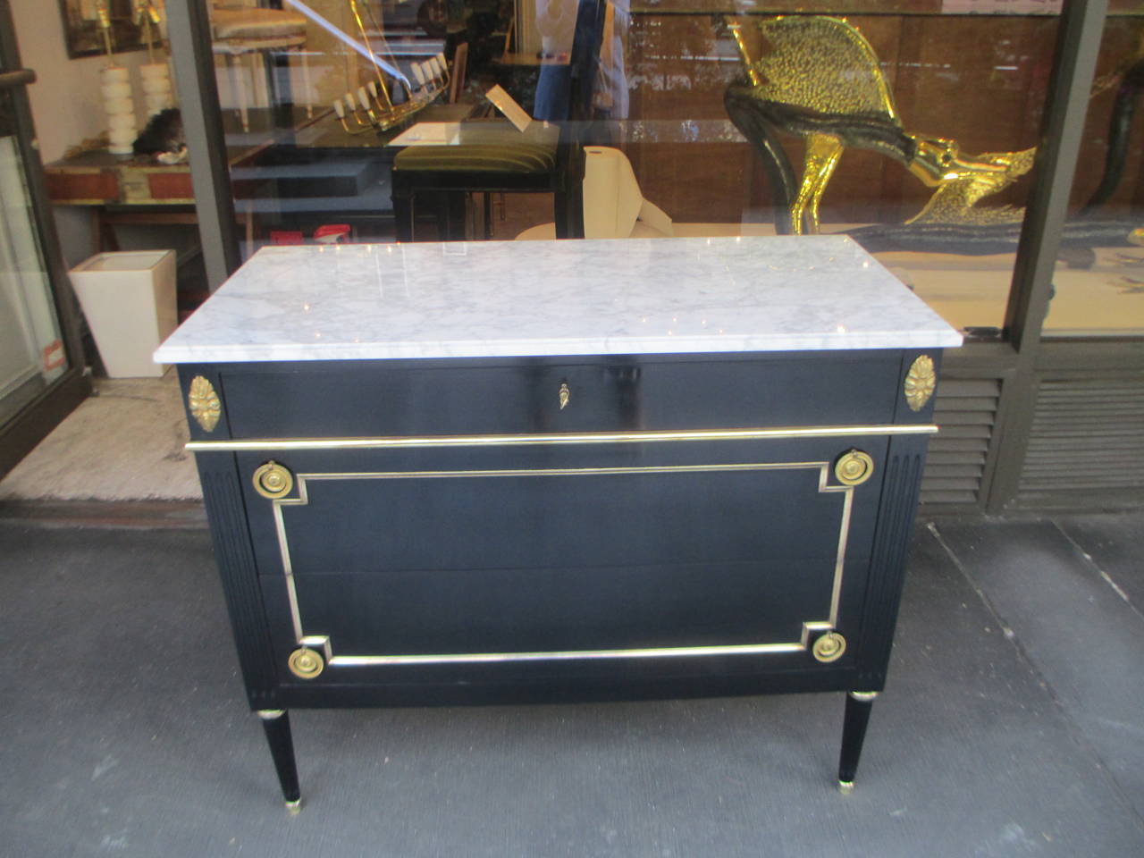 Exquisite Directoire-Style Marble-Top Commode with Applied Bronze, featuring three drawers, attributed to Maison Jansen