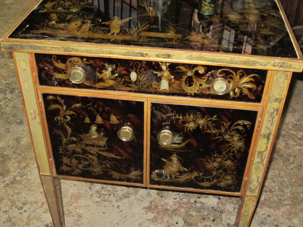 An Exceptional Pair of Reverse-Painted Chinoiserie Tables