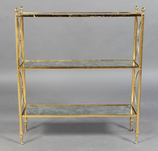 Exquisite Regency style brass etagere with distressed mirror