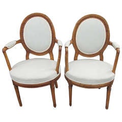 A Pair of Louis XVI Style Fruitwood Fauteils/Armchairs