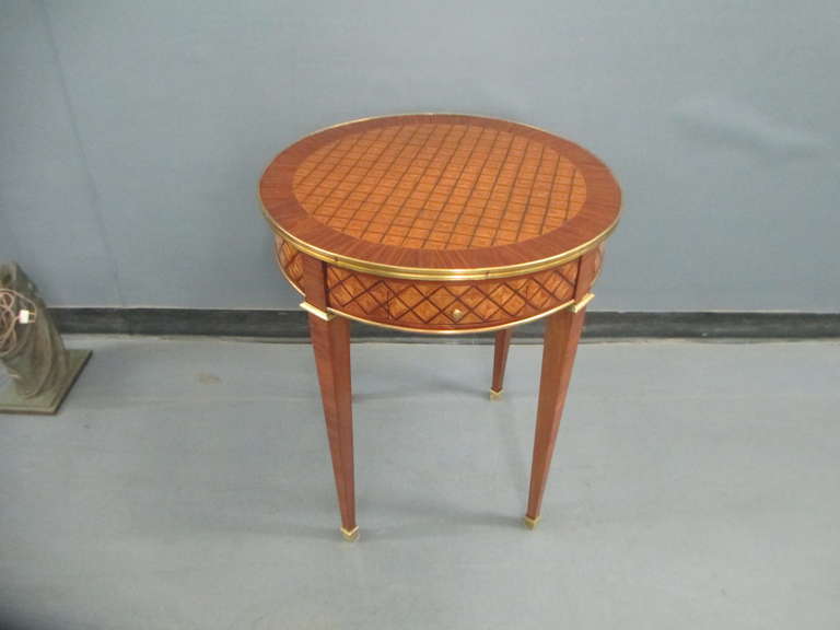 A pair of parquetry bouillote tables on tapered legs, with two pull-out drawers.

Price reduced / Net price $5,800.